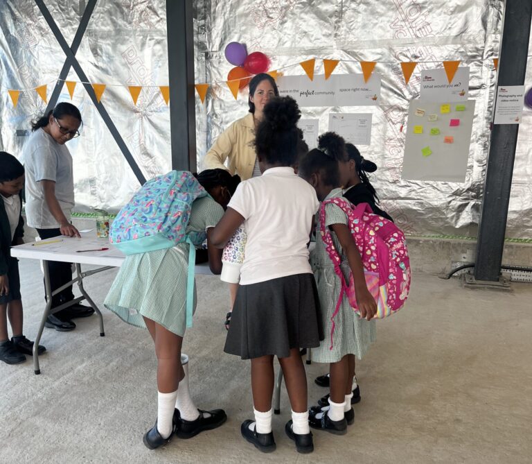 Young people scribbling ideas in an empty building